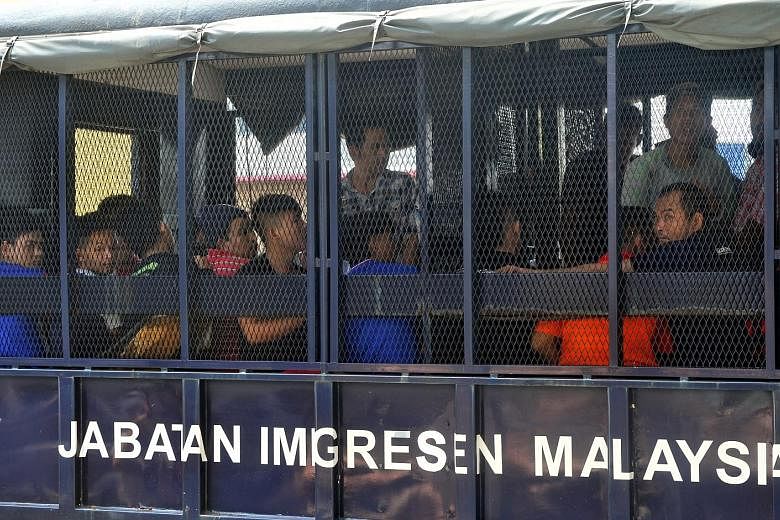 Some 40 foreign workers and their employer were arrested last Saturday in a raid by the Malaysian Immigration Department in Ipoh, Perak, for not having E-cards, which function as temporary confirmation of employment for illegal foreign workers.