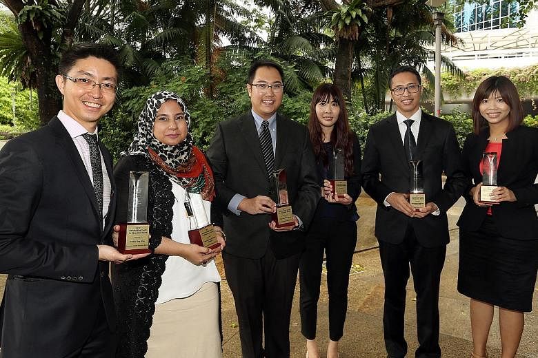 Receiving the Outstanding Youth in Education Award 2017 are (from left): Mr Chew Jing Wen, Madam Farah Haider Alsagoff, Mr Simon Sng, Ms Sarene Loh, Mr Muhamad Fadly and Ms Faith Huang.