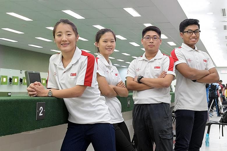Four Singapore shooters - (from left) Lim Yee Xien, Phaedra Tan Yee Joo, Sng Jian Hui and Mohd Irwan - will each make their SEA Games debut next month.