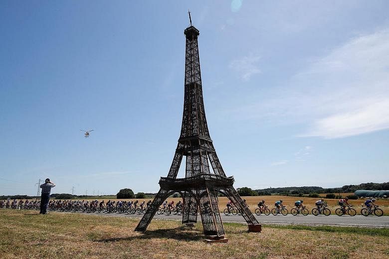 It's still a long way to go before the finale in Paris, even as the pack of riders cycled past a replica of the Eiffel Tower during yesterday's Stage 6. Three-time Tour winner Chris Froome leads the race.