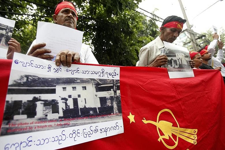Representatives from the All Burma Federation of Student Unions at a service (left) held every year in memory of those killed during a crackdown on a student protest at the university (above) on July 7, 1962. Myanmar citizens living in Thailand prote