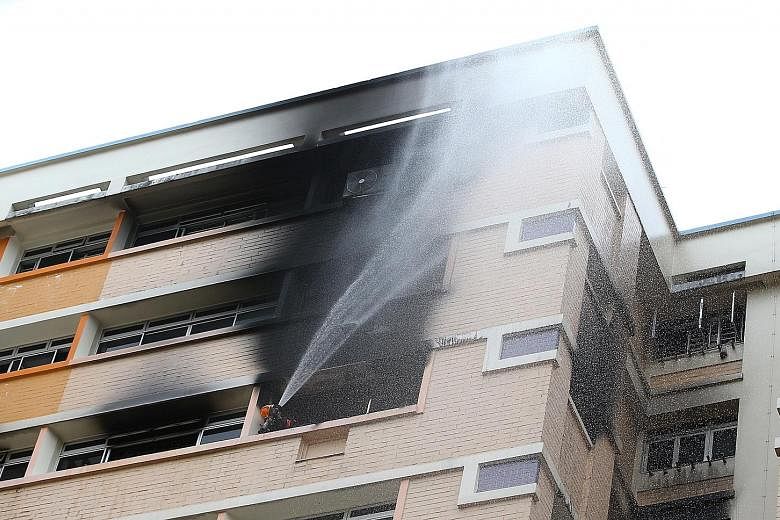 If a neighbouring unit is ablaze and rescuers have not arrived, it is advisable to leave, alert one's neighbours, and evacuate to a refuge floor or to the ground level without using the lifts.