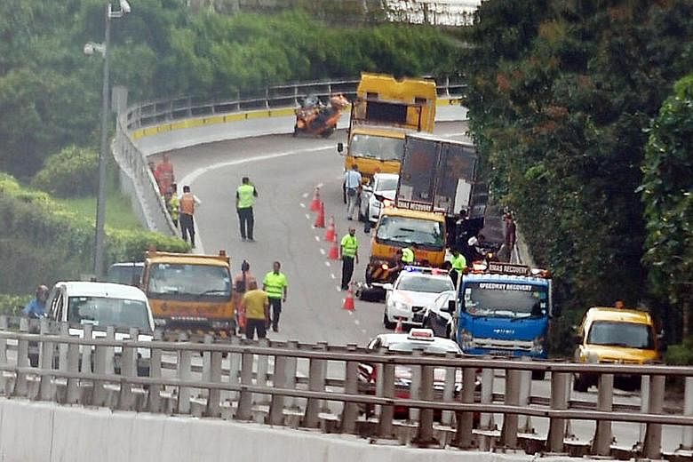 Yesterday's accidents took place at around 7.20am along the SLE, after Woodlands Avenue 2. They happened in the area connecting to a slip road towards Bukit Timah Expressway, in the direction of the Pan-Island Expressway.