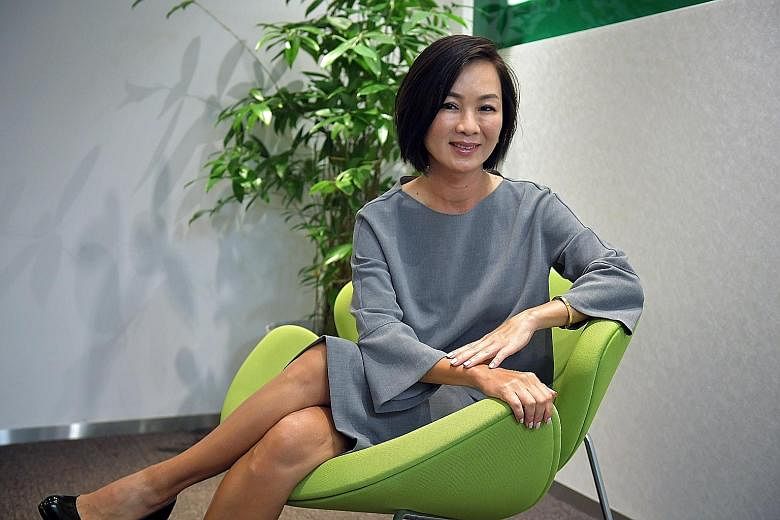 Ms Wendy Lim's career in the financial services industry started after she was shortlisted by Citibank in 1991 at a Singapore job fair in the United States. Since then, she has worked for AT&T, HSBC and ANZ, where she ran its retail bank operations i