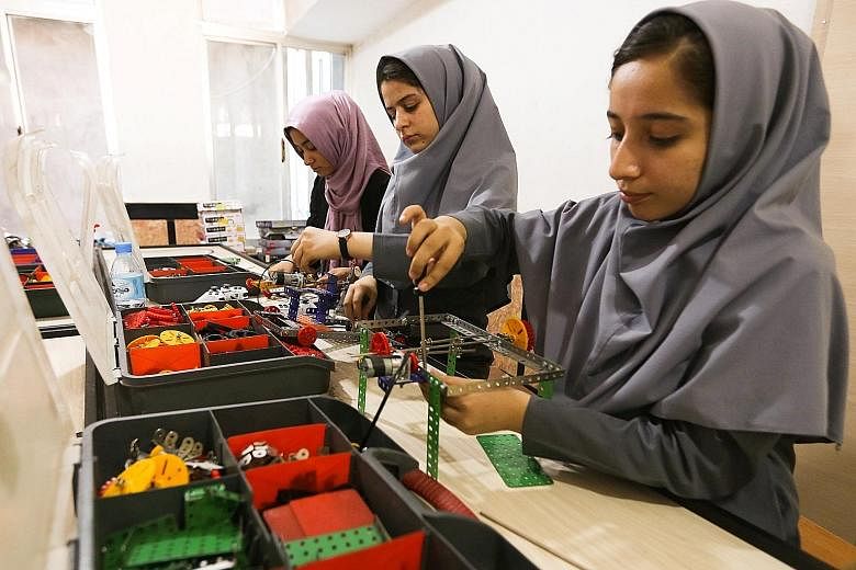 Members of the Afghan robotics team who were denied visas to take part in an robotics contest in Washington. The girls said US consular officers had asked whether they had relatives in the US and whether they intended to return home after the competi