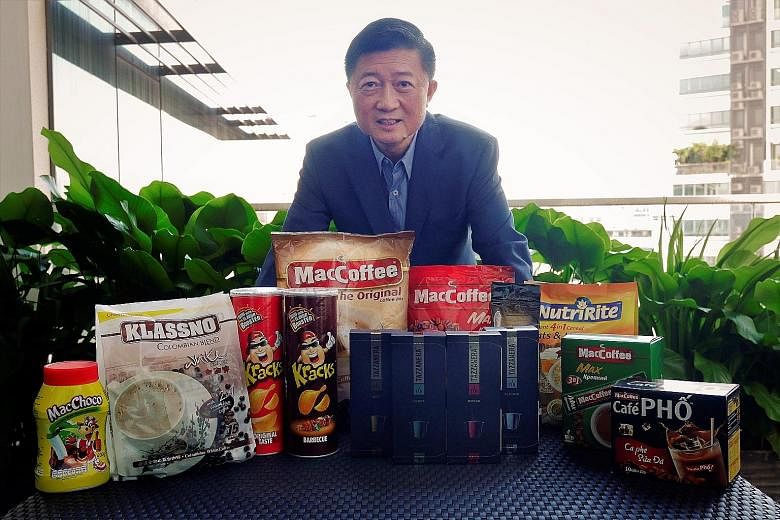 Mr Tan Wang Cheow with some of Food Empire's products. The company holds a 50 per cent share in the Russian instant coffee mix segment, and the country is its largest market, accounting for nearly half of total revenues last year.
