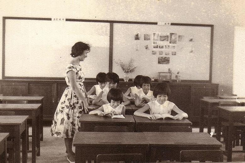 Students, staff, parents, alumni and the board of directors of Nan Hua Primary School creating a mass display in celebration of the school's centenary this year. 1950s: Teachers conducting outdoor sewing lessons at the then Nan Hwa Girls' School. 196