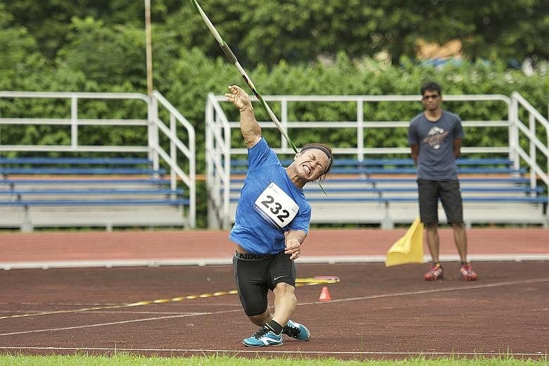 Javelin thrower and shot putter Muhammad Diroy Noordin competing yesterday at the National Inclusive Athletics Championships at Toa Payoh Stadium. About 160 participants attended the 45th edition of the event, where Senior Minister of State, Ministry