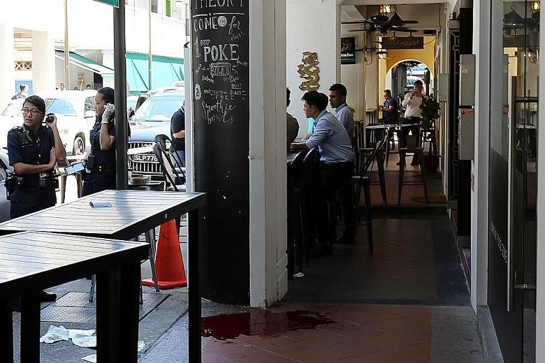 WHERE POLICE FOUND HIM: The area outside A Poke Theory eatery in Boon Tat Street, where Mr Tuppani collapsed after being stabbed. THE MURDER VICTIM: Mr Spencer Tuppani Shamlal Tuppani, who died after being stabbed on Monday, was CEO and director of T