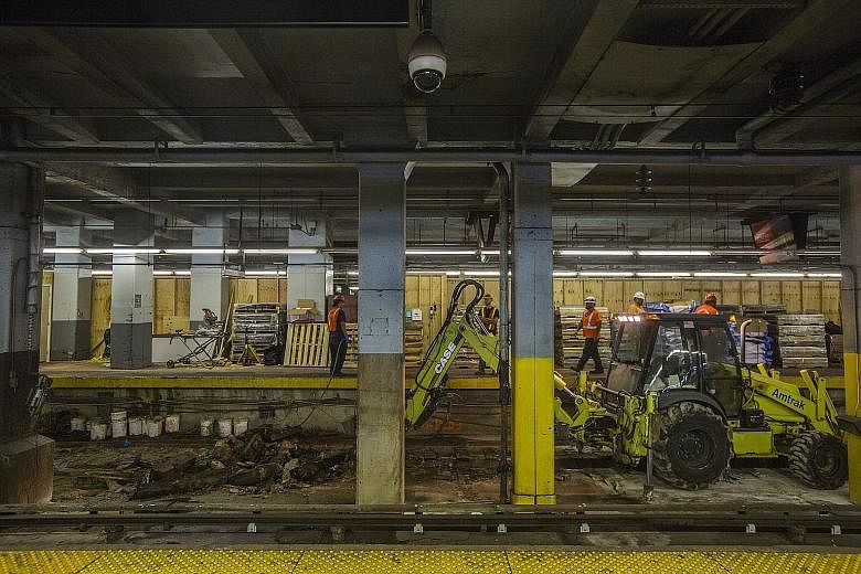 The widely dreaded first day of intensive track repairs at New York's Pennsylvania Station in Manhattan, the busiest terminal in North America, turned out to be far less hellish than forecast, but New York City's hardened commuters were reluctant on 