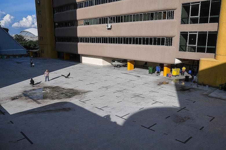 The market's association's contractor started demarcating vendor lots at the carpark on Tuesday without permission from LHN Group, which has since lodged a police report for what it describes as an act of vandalism.