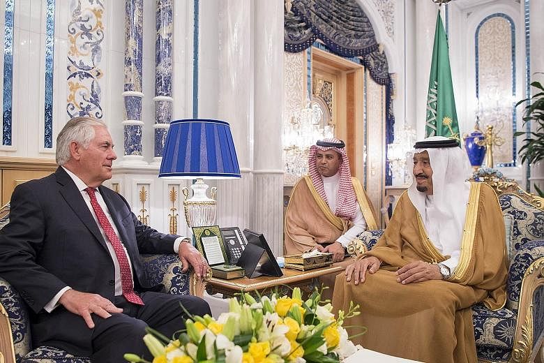 United States Secretary of State Rex Tillerson (left) flew into Saudi Arabia where he met King Salman (right), whose country is leading a four-state alliance that has cut ties with Qatar over accusations that it supports extremism. The crisis has pre