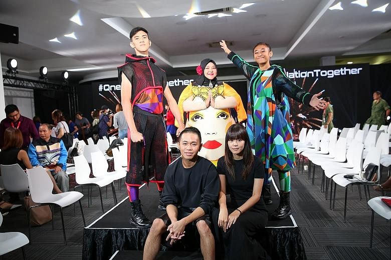 Mr Max Tan and Ms Yuan Zhiying, who are designing for the National Day Parade for the first time, have 140 designs which have been used to produce about 3,000 pieces.