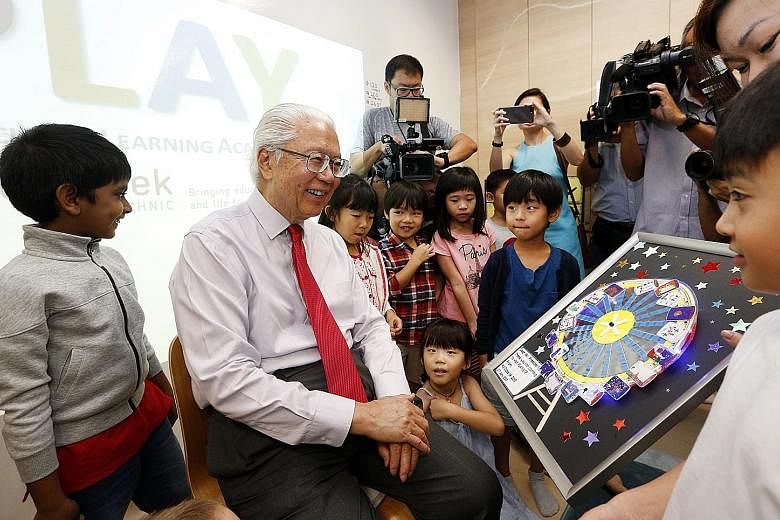 President Tony Tan visiting Play@TP, the polytechnic's experimental kindergarten, where poly students taking an early childhood studies course get a chance to teach pre-schoolers under the guidance of a mentor-teacher, while the kids are encouraged t