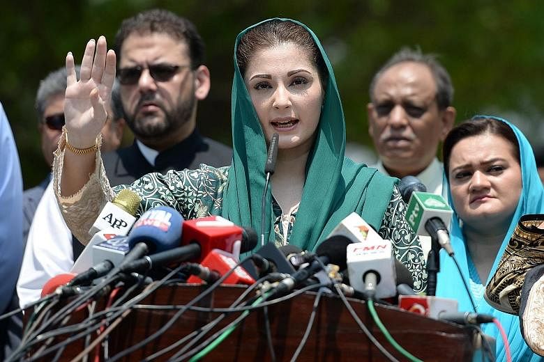 Ms Maryam Nawaz Sharif, the daughter of Prime Minister Nawaz Sharif, talking to journalists in Islamabad on July 5 after appearing before an investigation team formed by the Supreme Court.