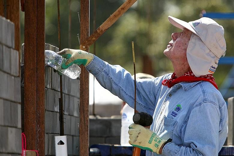 Mr Jimmy Carter taking part in Habitat for Humanity building efforts in Chiang Mai, Thailand, in 2009. He was in Canada doing work for the organisation when he collapsed on Thursday.