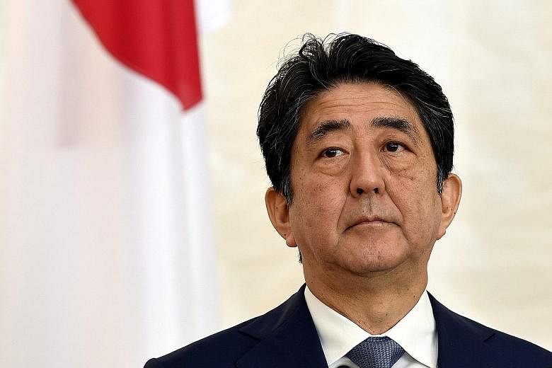 Embattled Japanese Prime Minister Shinzo Abe is eyeing a Cabinet shake-up next month to win back public trust.