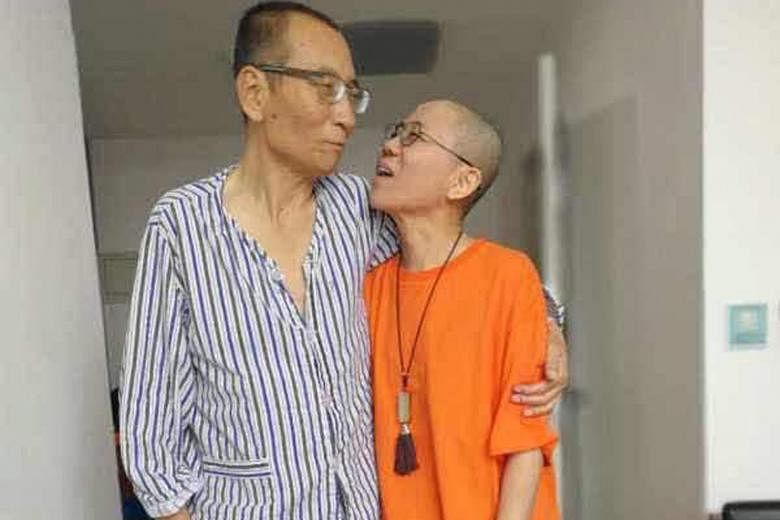 An undated photo of Chinese dissident Liu Xiaobo with his wife Liu Xia at an undisclosed location. Chinese doctors said Madam Liu was by her husband's side when he died of liver cancer in custody on Thursday.