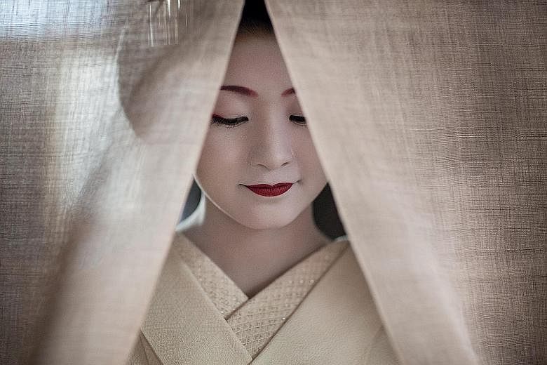 In more than 80 photos, photographer Philippe Marinig captures how maiko in Kyoto live and work.