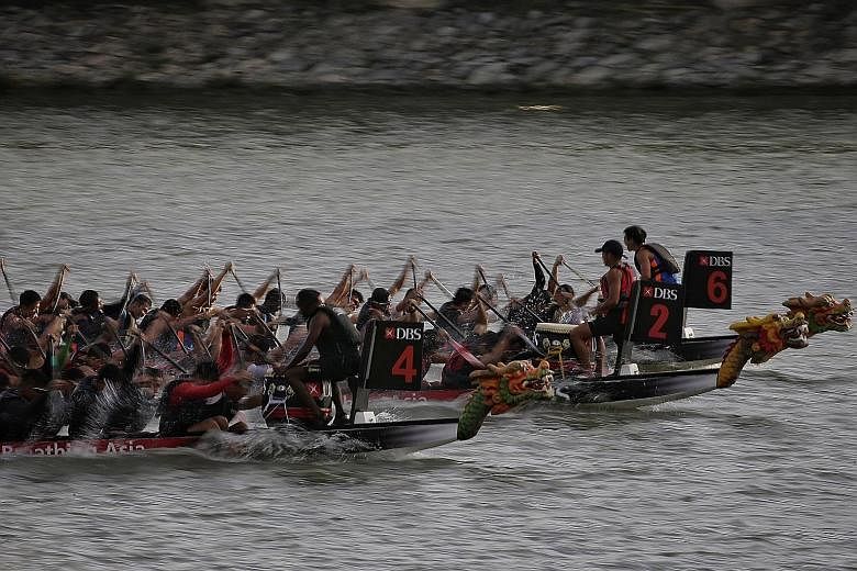 […]Competitors from SIM (boat No. 4) in action against SMU (not in picture), NTU (No. 2) and NUS (No. 6) during the Prime Minister's Cup men's final at the Singapore Dragon Boat Festival[/…]. Their women's team won their final.