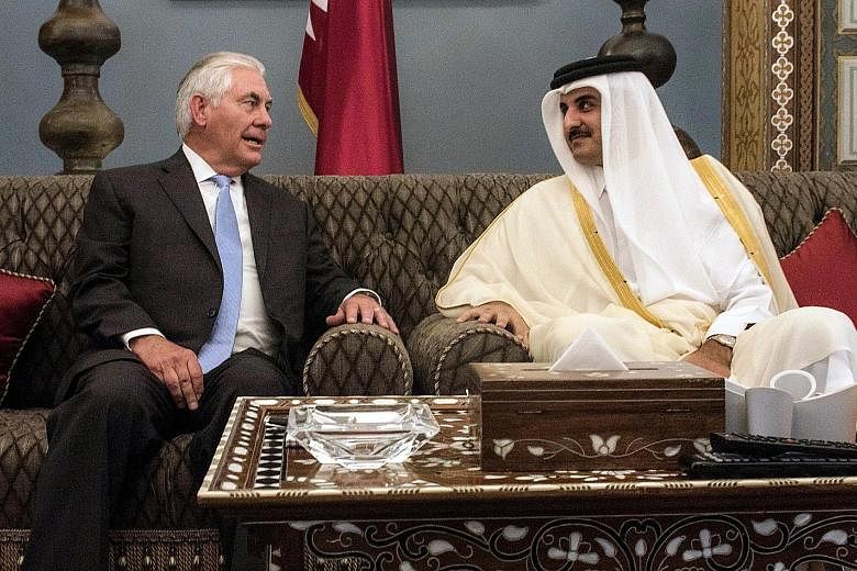 Secretary of State Rex Tillerson with Sheikh Tamim bin Hamad al-Thani in Doha.