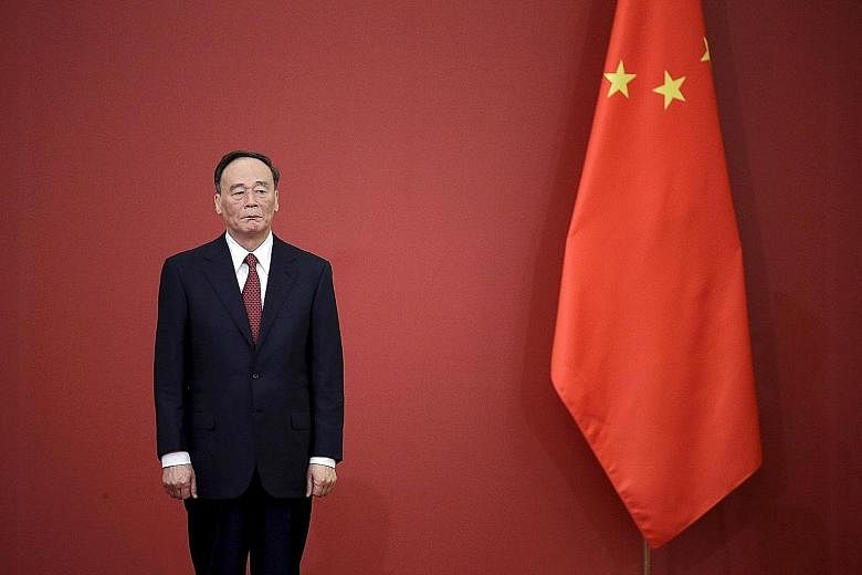 Mr Wang Qishan (in a 2015 photo) runs the Communist Party's anti-corruption watchdog and is widely considered to be its most powerful man after President Xi Jinping.