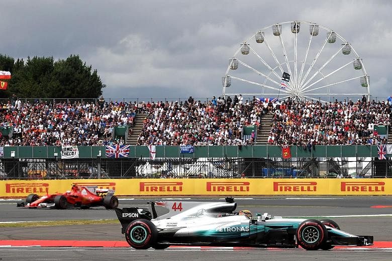 British Grand Prix winner Lewis Hamilton leading second-placed Kimi Raikkonen at Silverstone last Sunday. The Finn had a late tyre problem and finished third, but Ferrari hope to bounce back in Budapest.