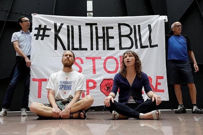 Activists in Washington protesting against the proposed Republican healthcare Bill.