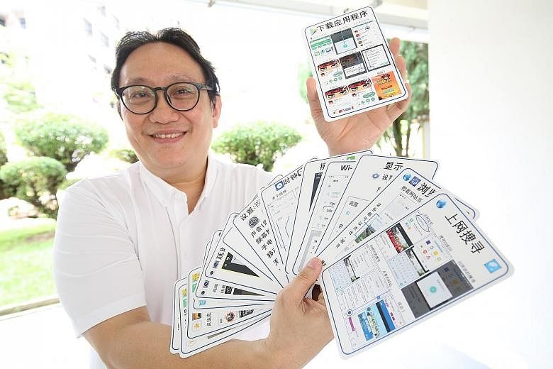 Above: Grassroots leader Chiew Tuan Kiang with the flash cards he uses to teach seniors how to use their smartphones. Left: Madam Lee Siew Kuan, 99, says she will be happy if centenary birthday celebrations are held. Bukit Batok MP Murali Pillai with