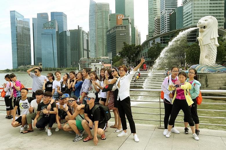 Chinese tourists at Merlion Park. The Hotels.com survey found that when choosing a holiday destination, safety was paramount to Chinese travellers. They also tended to prioritise destinations with historical and heritage value, and those that offer a