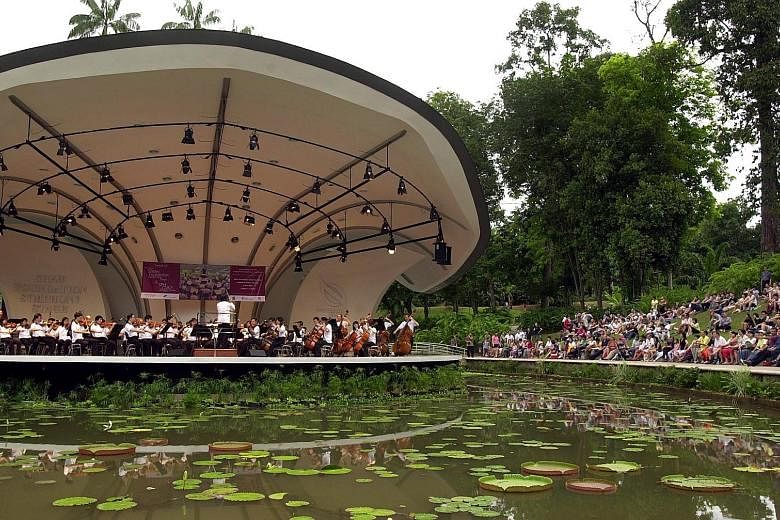 The SSO performing at a previous Singapore Press Holdings' Gift of Music concert at the Botanic Gardens. On Saturday, it will perform music from the popular musical West Side Story, among other well-loved classics.
