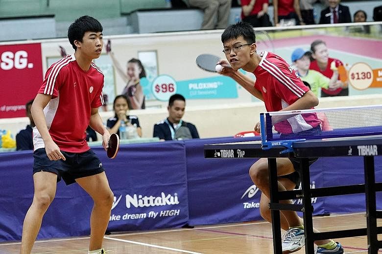 Singapore's Gerald Yu (left) and Josh Chua in the boys' doubles final against Vietnam's Le Dinh Duc and Nguyen Anh Duc at the Toa Payoh Sports Hall. They won 11-3, 11-8, 11-6.