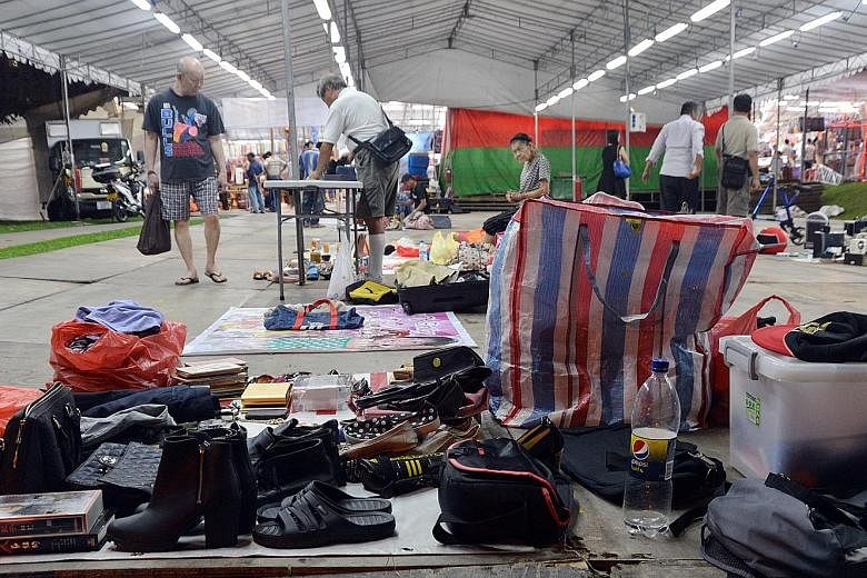 Former Sungei Road vendors, unable to sell their goods at the now-defunct Sungei Road market, opened shop once again at a pasar malam (night market) in Sembawang yesterday evening. The Sungei Road market, also known as the Thieves' Market, was closed