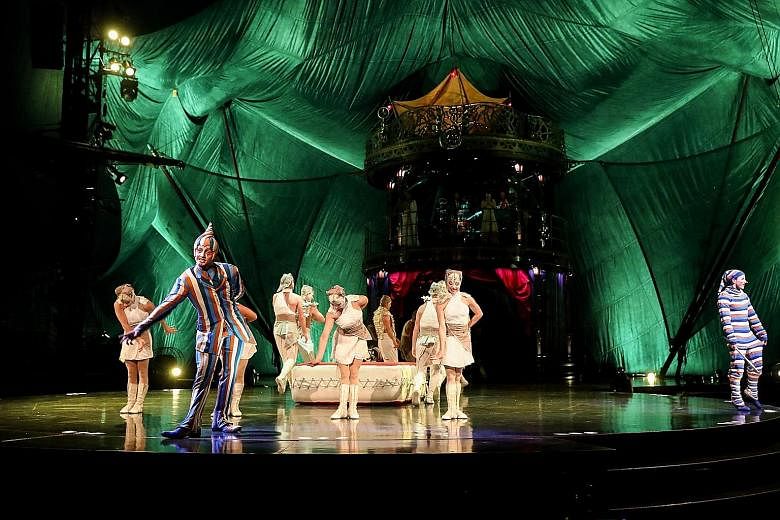 American performer Derek Piquette (left) is the Trickster (above) in Cirque du Soleil's Kooza.