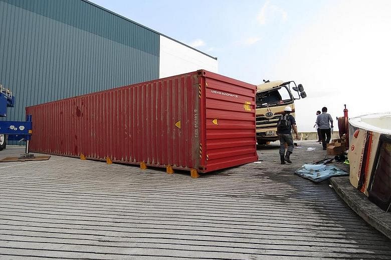 Mr Yu Hairui died after the container on his prime mover dislodged and toppled onto the vehicle's cabin.