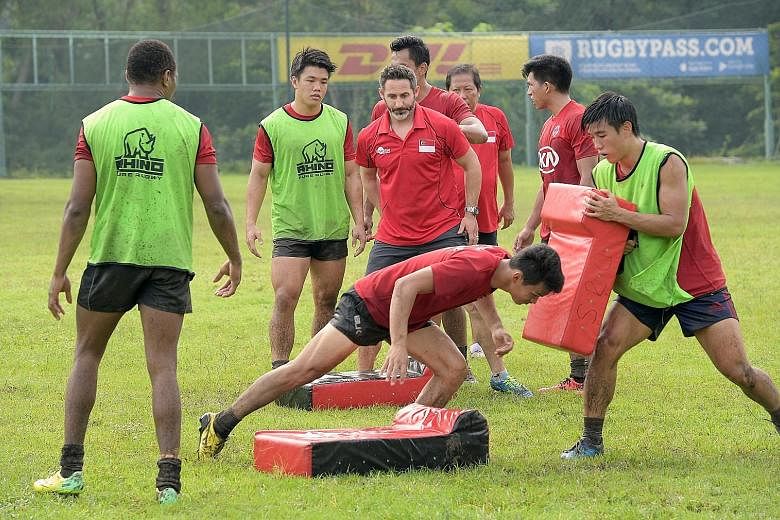 Retired English great Ben Gollings conducting training with the Singapore national rugby sevens team last Saturday at Turf City. The 14-man squad will head to Brisbane next Thursday for a four-day training camp.