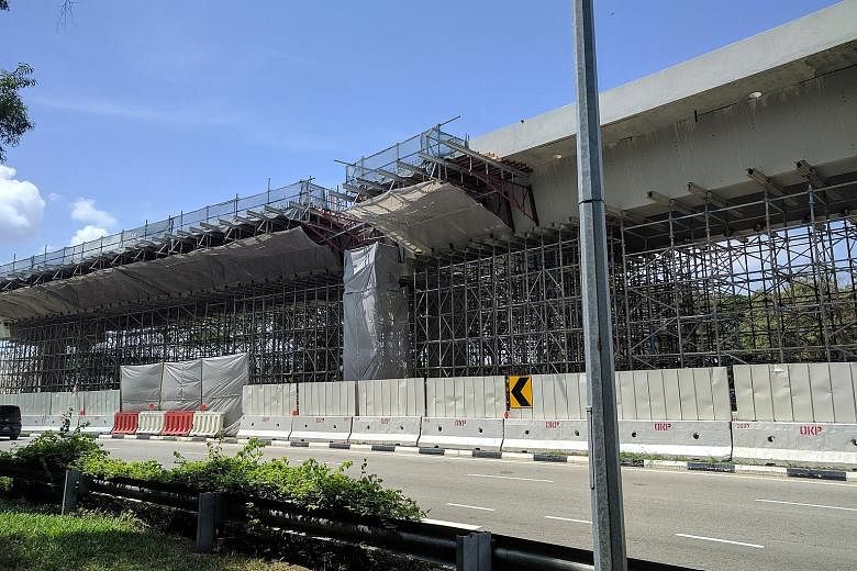 Scaffolding put up as additional support could be seen yesterday afternoon. According to the LTA, it helps prop up beams at the remaining spans of the viaduct, where cracks have been found at 11 locations on load-bearing corbels.