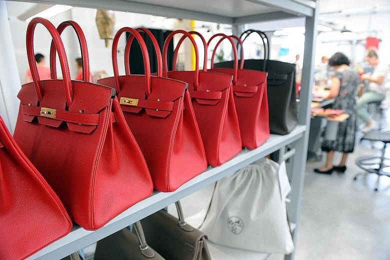 Hermes' chief executive Axel Dumas said that the mood at the company is "optimistic" and that sales momentum remained "quite good" with sustained demand for the brand's Birkin (above), Kelly, Constance and Lindy bags, and robust demand for shoes, whi
