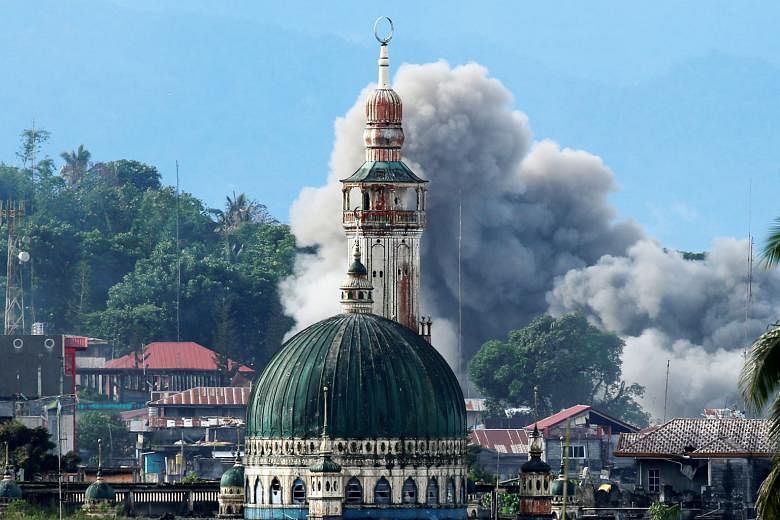 An explosion in Marawi City after an air strike on June 29. ISIS may fade out in Iraq and Syria physically, but its ideology will remain alive and continue to lure those who are marginalised economically, deprived politically and retarded culturally,