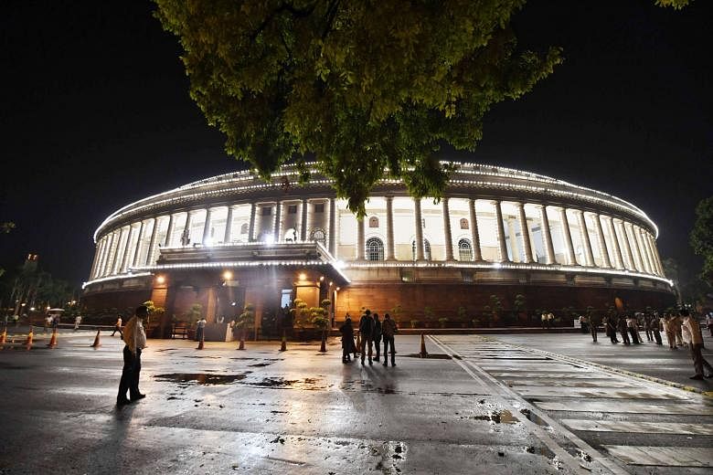 The Indian Parliament in New Delhi. As India's legislators refuse to codify their privileges, this "undefined threat of a breach of privilege constantly hangs" over journalists and muzzles the press, says the writer.