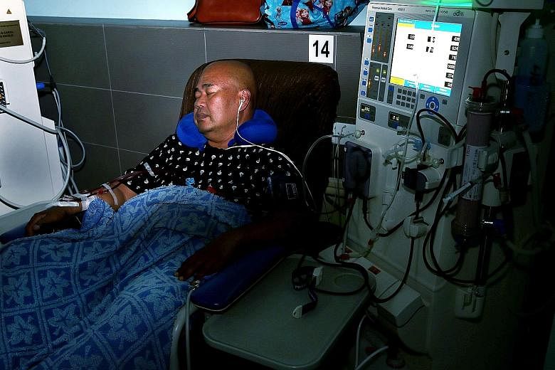 Mr Jais Minsawi undergoing night dialysis at the National Kidney Foundation's Hougang centre. Research shows that patients on nocturnal sessions were hospitalised less, gained more weight and had lower blood pressure when compared with those who unde