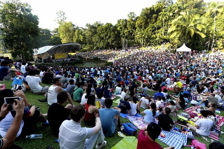 Young concertgoers also got to enjoy a good read as about 2,000 books were given out, sponsored by Scholastic. Attendees at The Straits Times Concert in the Gardens at the Singapore Botanic Gardens yesterday enjoyed an hour-long performance by the Si