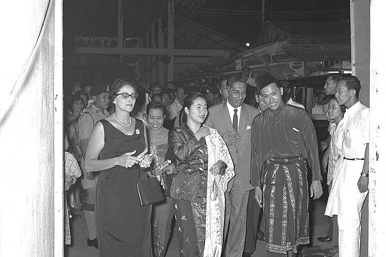 The newly installed Yang di-Pertuan Negara Yusof Ishak and his wife Noor Aishah attending their very first official function, Aneka Ragam Surat-Surat Khabar, a newspaper variety show, at the Happy World Stadium on Dec 3, 1959. The event was part of a