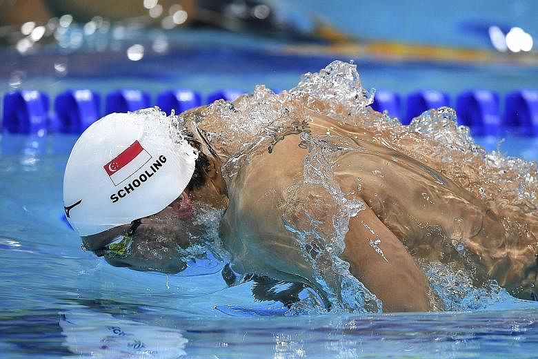 Olympic champion Joseph Schooling broke the national 50m butterfly mark twice yesterday, clocking 23.05sec in the heats (above) and then 22.93sec in the semi-finals.