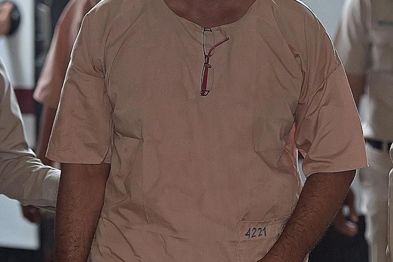 Army "Big Shot" Manas Kongpan arriving in court in Bangkok in November 2015. Manas, who sat at the apex of Thailand's grisly trade in humans, was sentenced to 27 years in prison on Wednesday.