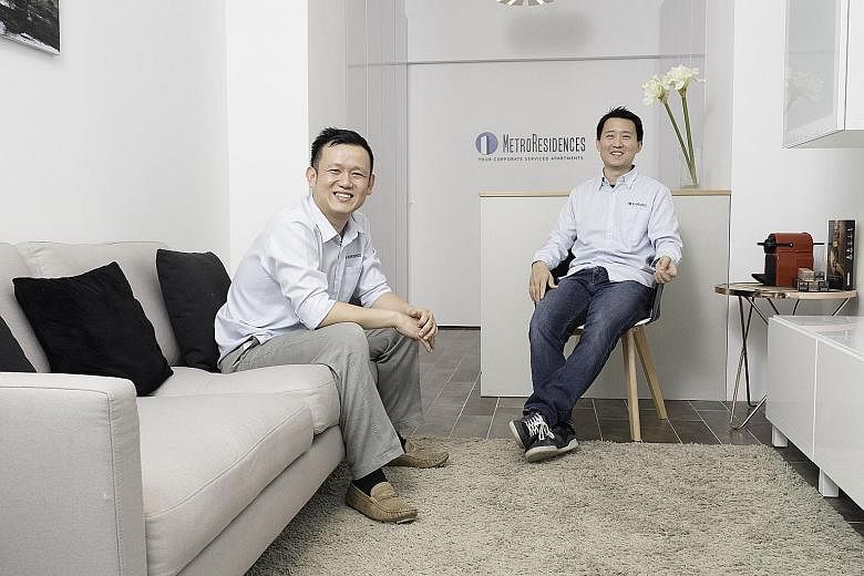 Co-founders Lester Kang (far left) and James Chua of MetroResidences, which is holding a soft launch in Tokyo today. The Singapore start-up now has about 50 listings, including this two-bedroom serviced apartment (above) in the city's Shibuya ward. M