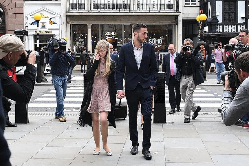 Ms Connie Yates and Mr Chris Gard arriving at the High Court in central London yesterday. The couple had fought a long legal fight to allow them to take their sick child to the US for experimental treatment.