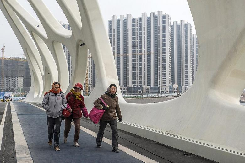 A newly constructed bridge inside Dalian Wanda Group's Oriental Movie Metropolis project site in Qingdao, China. Led by Mr Wang Jianlin, the conglomerate built theme parks and bought hotels under its cultural tourism project.