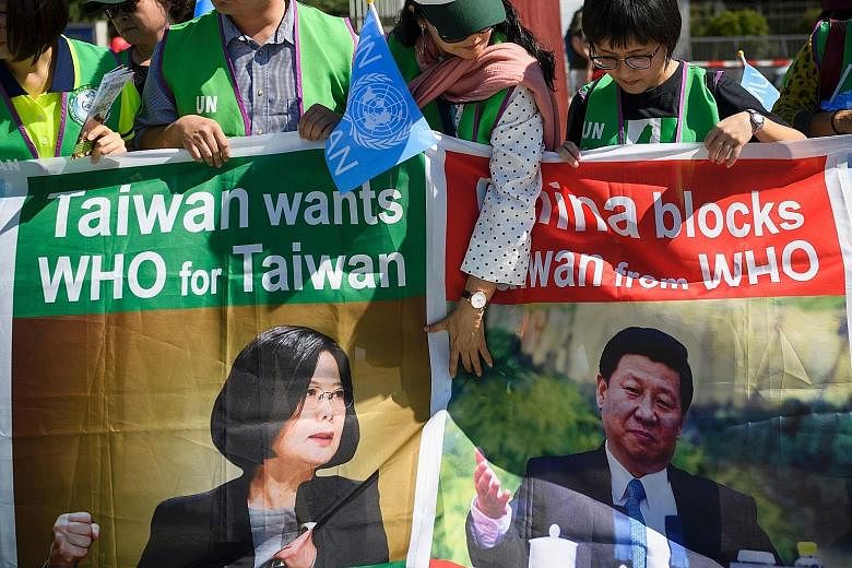 Pro-Taiwan protesters demonstrating outside the United Nations offices on the opening day of the World Health Organisation's (WHO) annual meeting in Geneva, Switzerland, in May. China has consistently blocked Taiwan's efforts to take part in internat