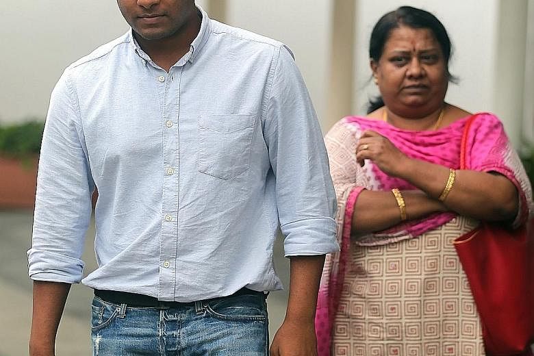 Vandana Kumar Chidambaram leaving the State Courts with his mother last October.
